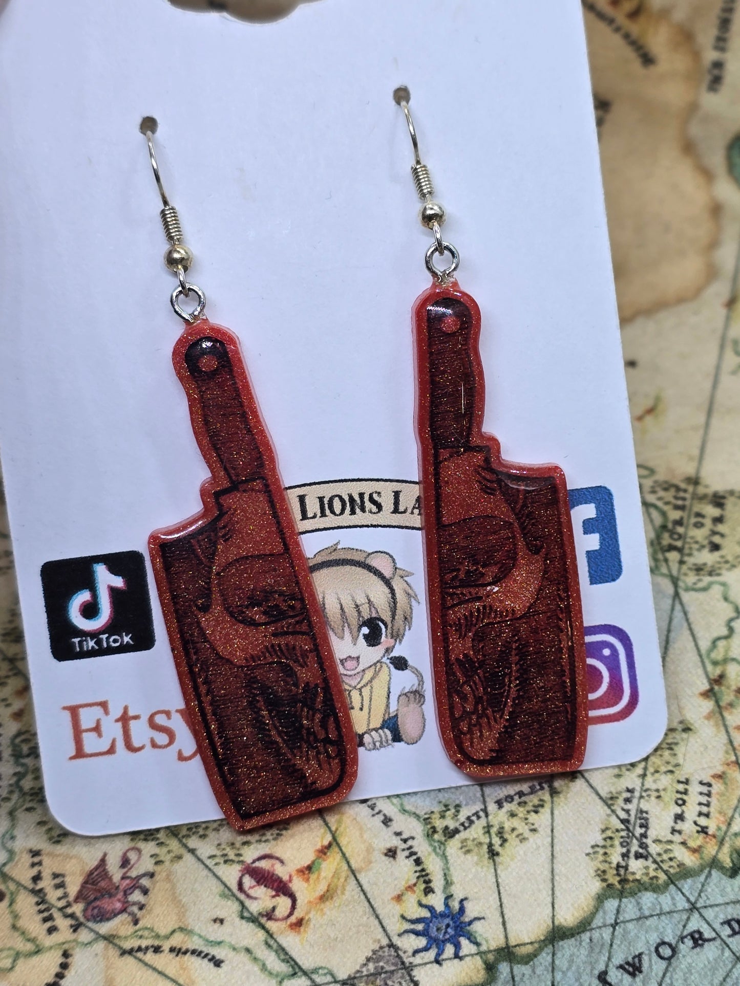 Skull butcher knife earrings
