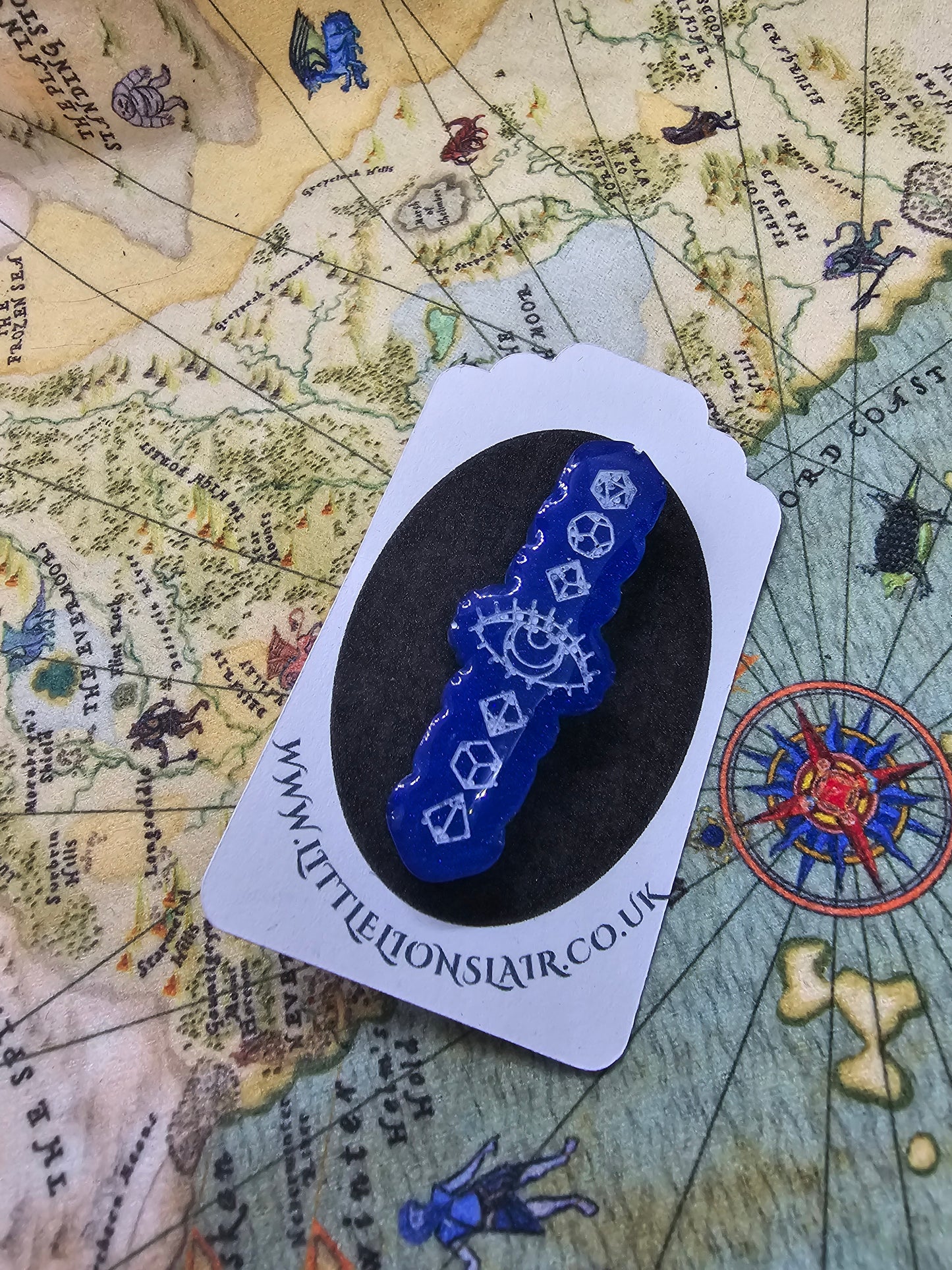 Seeker of dice pin badge