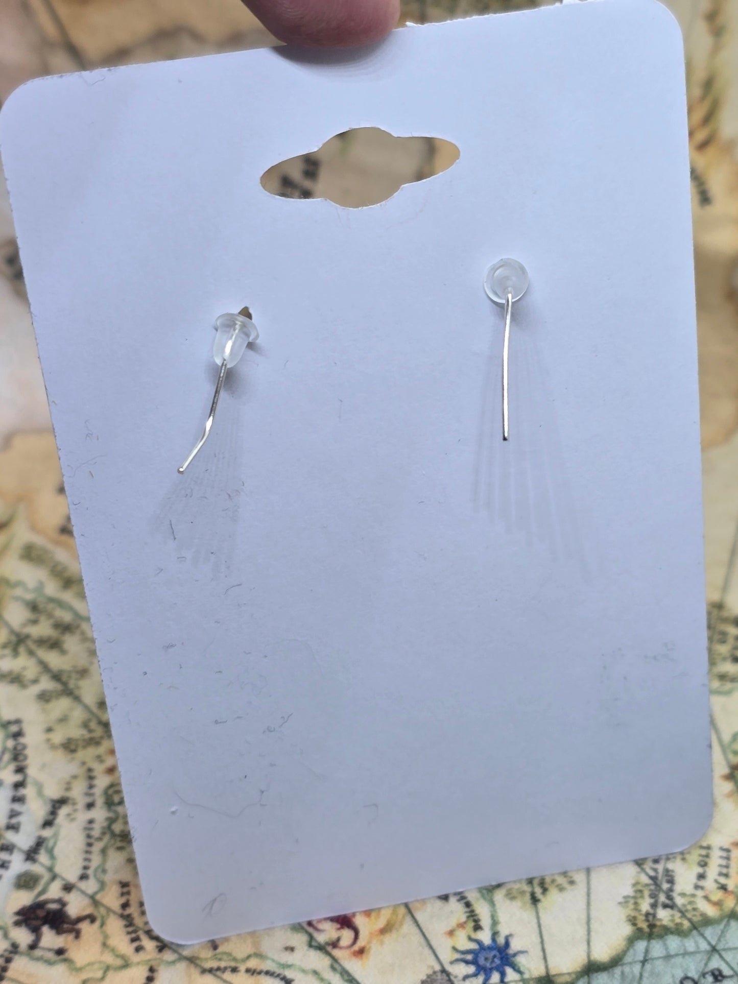 Spaced out dangle earrings