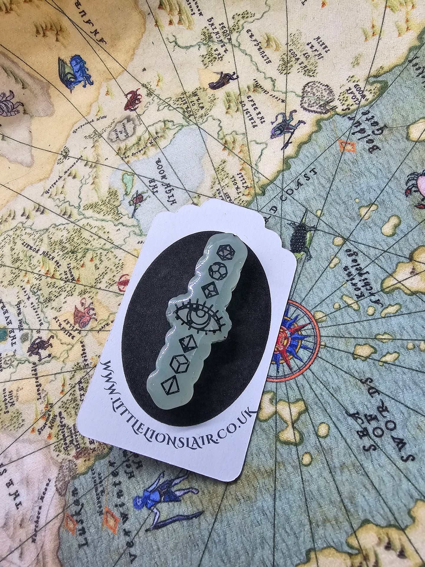 Seeker of dice pin badge