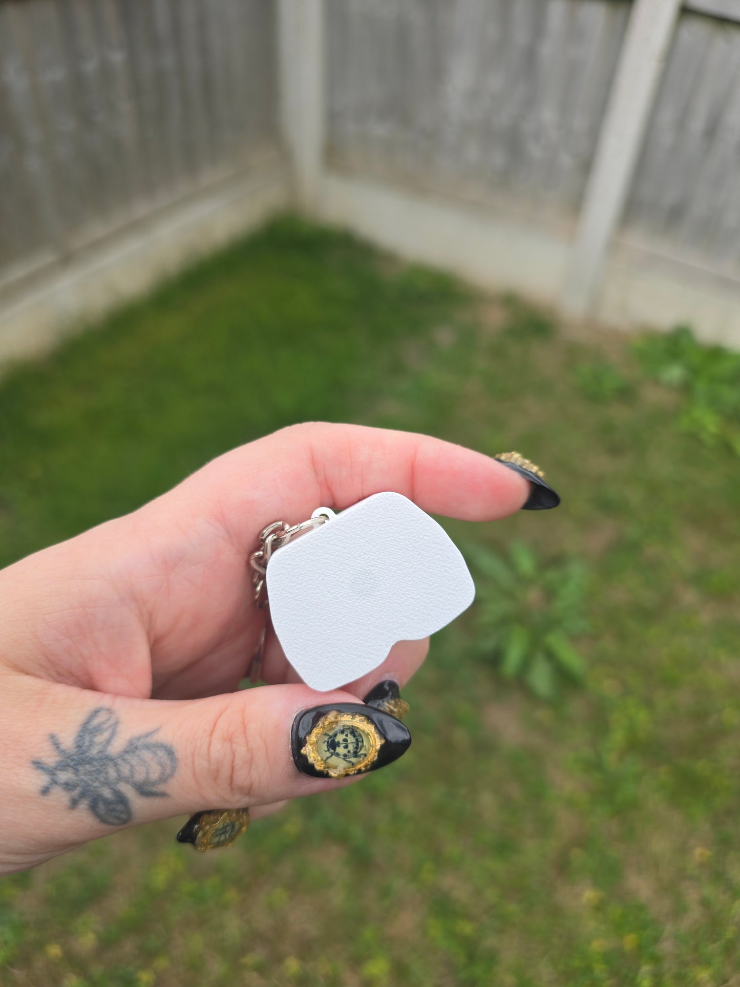 Dungeon crawler Carl Fidget clicker keyring