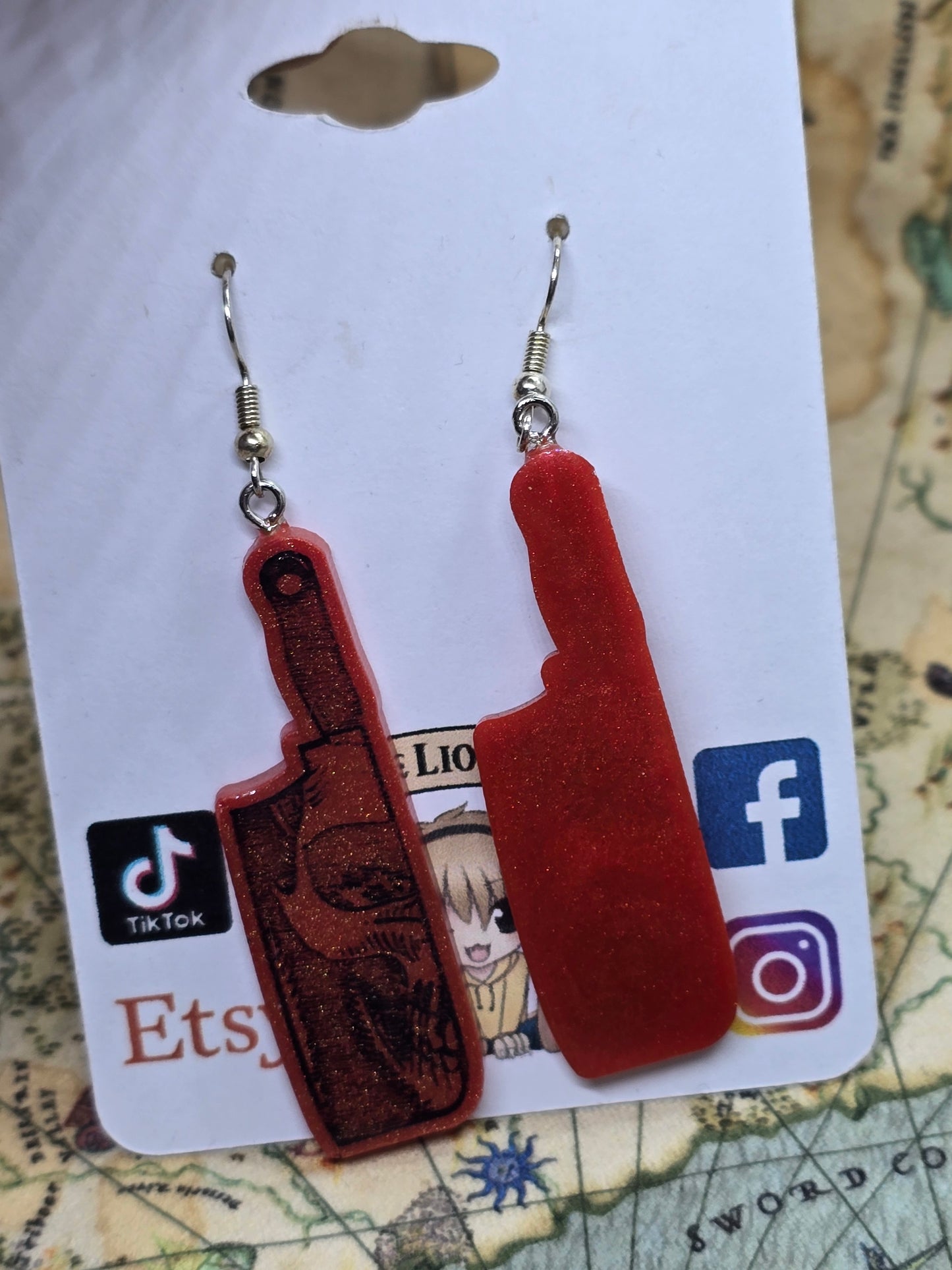 Skull butcher knife earrings