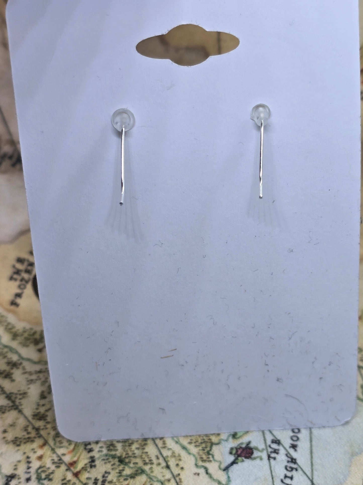 Spaced out dangle earrings